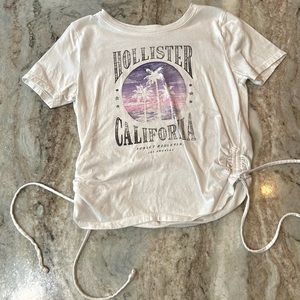 Gently used Hollister top w/ adjustable ties on the sides.